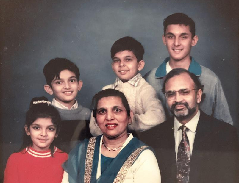 A young Qasim with his family